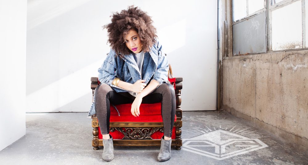 Photo by Michelle Claire Gevint Arlene Gould seated on a red velvet chair — Photo by Michelle Claire Gevint